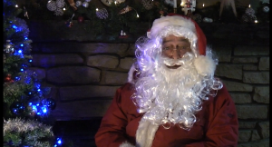 Santa telling Christmas Stories to raise funds for Dukinfield and Stalybridge Rotary Club